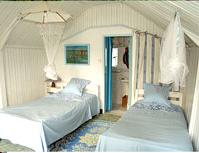 Voyage sur-mesure, Bungalows dans un jardin tropical